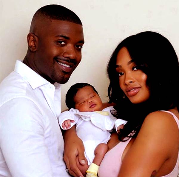 Image of Ray J with his wife Princess Love and his daughter Melody Love