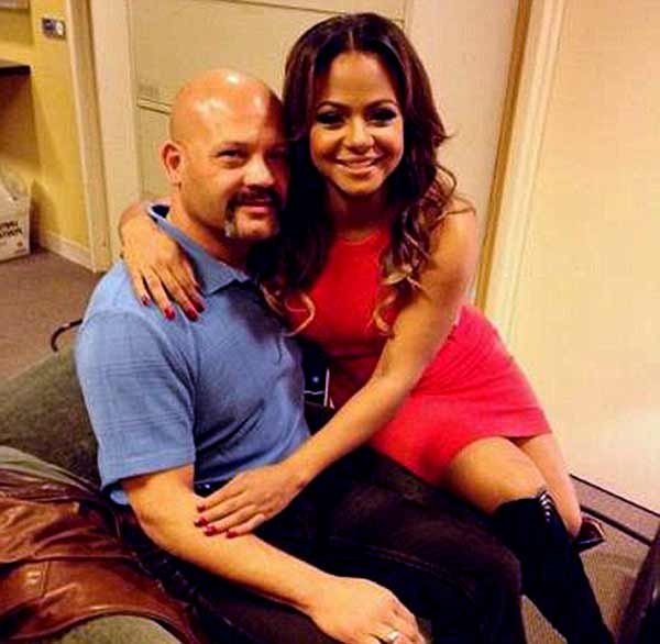 Image of Christina Milian with her father Don Flores